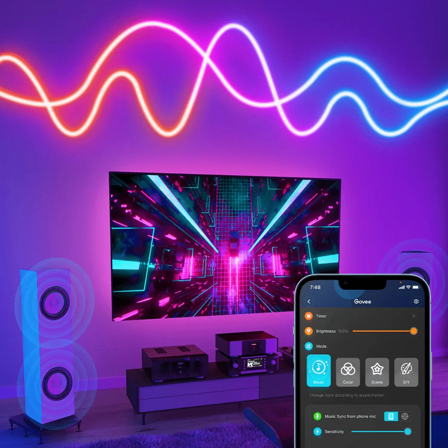 Tira LED Govee RGBIC instalada detrás de monitor gaming con efecto neon