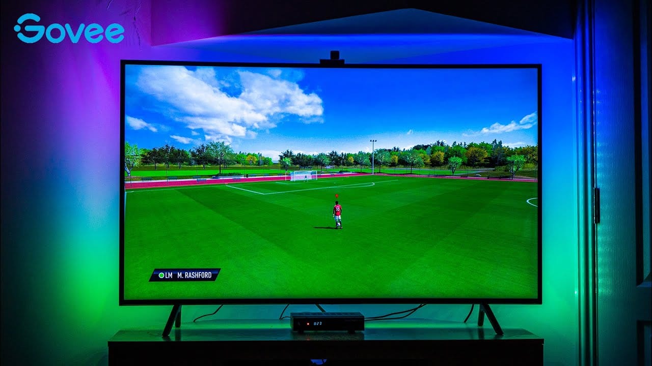 Govee TV Backlight 3 Lite efecto de luz ambiental multicolor en sala Guatemala